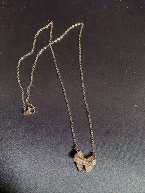 Avon Silver Bow Pendant Necklace